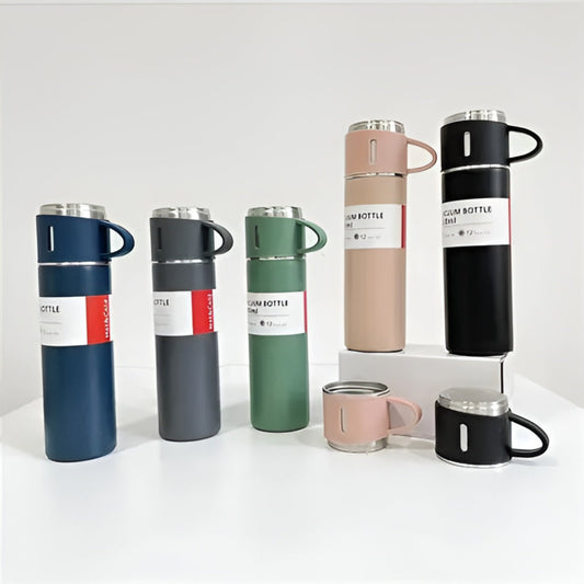 Set of colorful insulated travel mugs on a white background