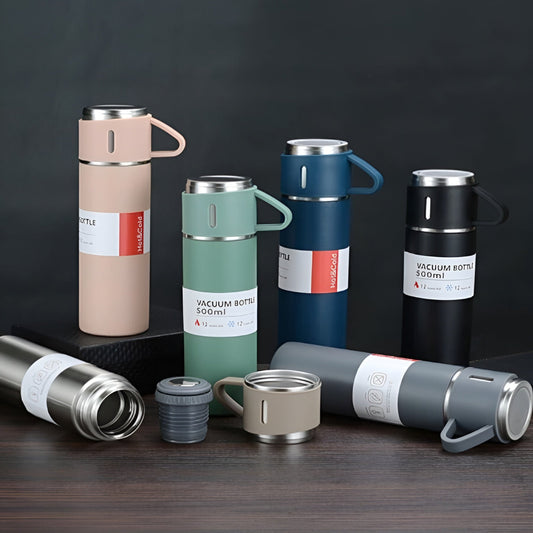 Collection of vacuum bottles in various colors on a dark background